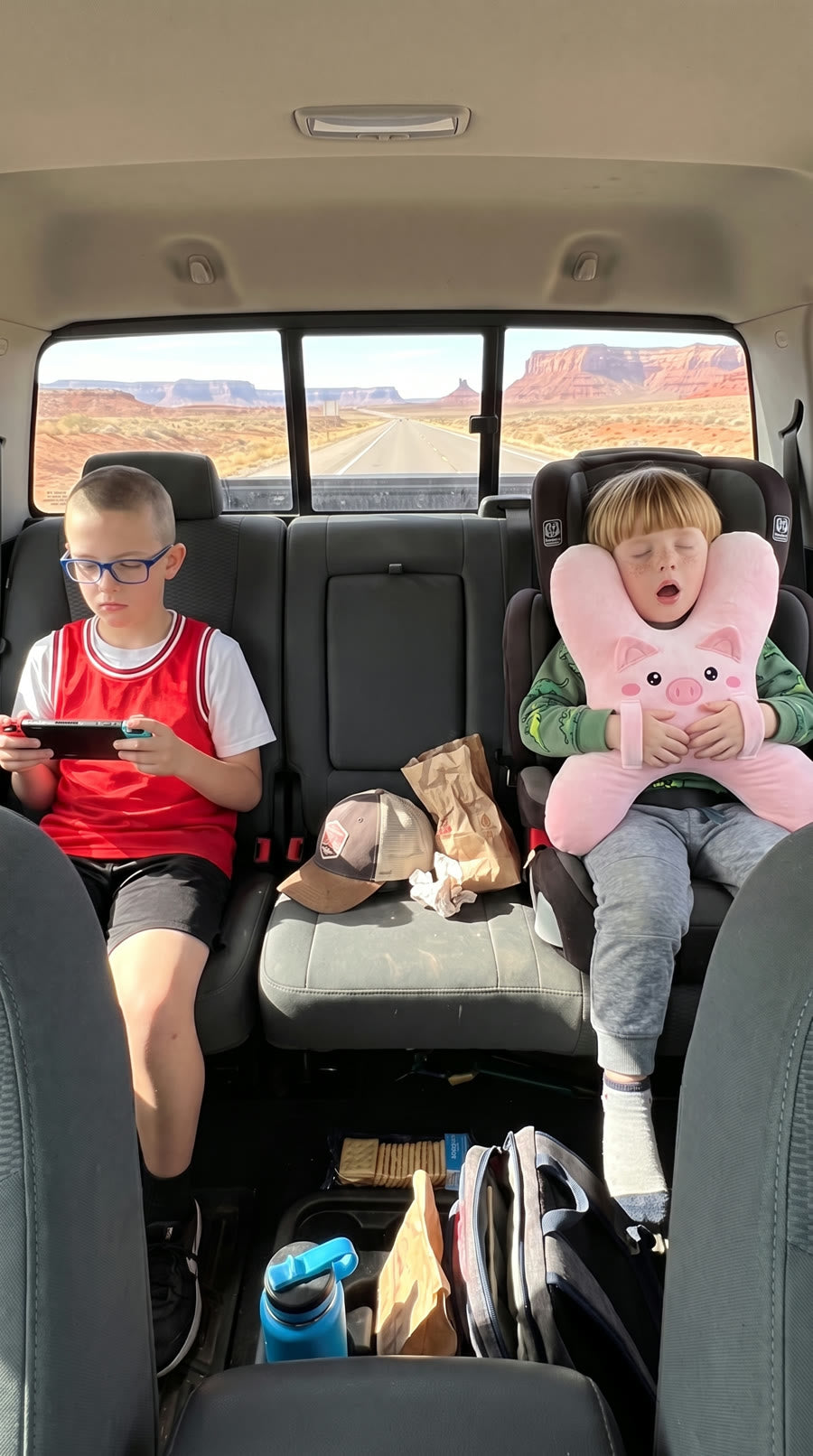 Kids sleeping with DozyRide on the go